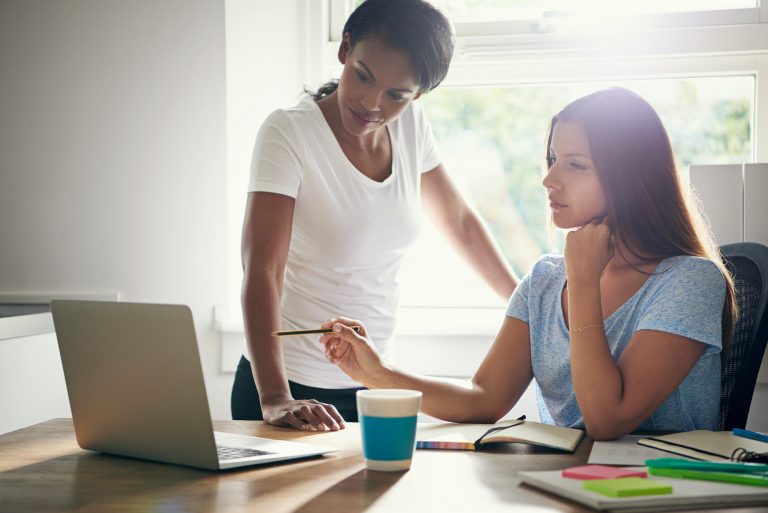 Two women business partners in a discussion